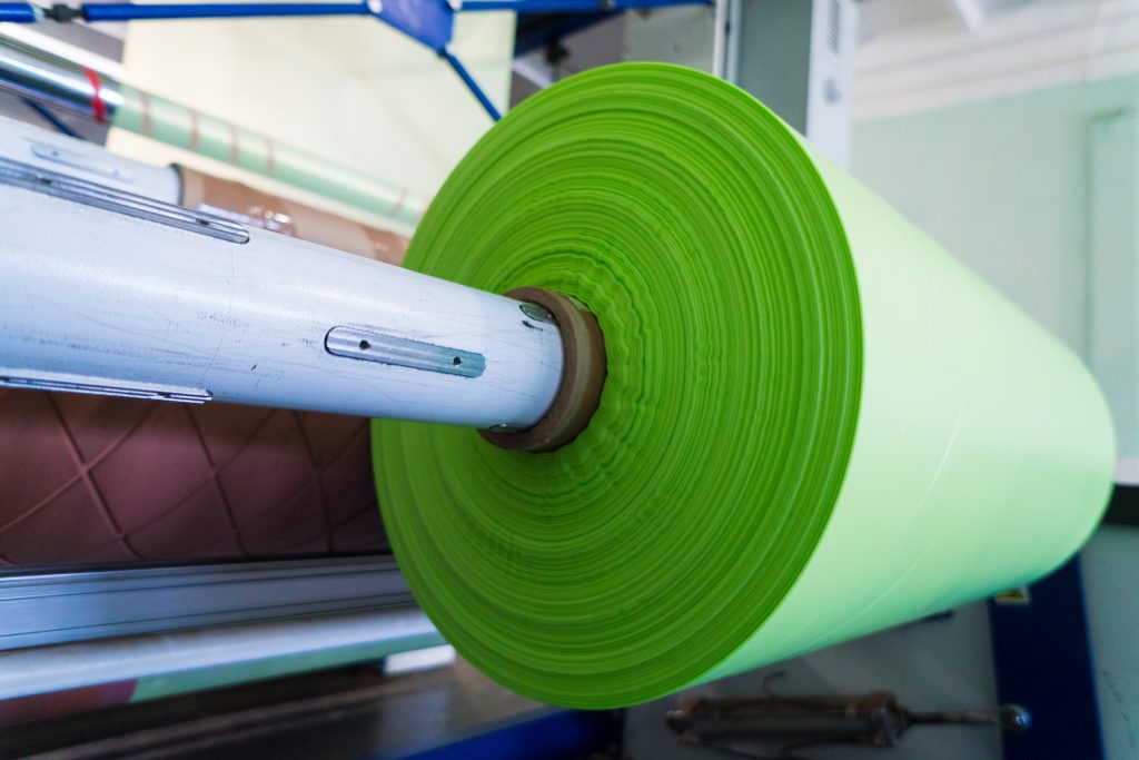 green roll of thermoplastic sheets for polyethylene or polypropylene bags