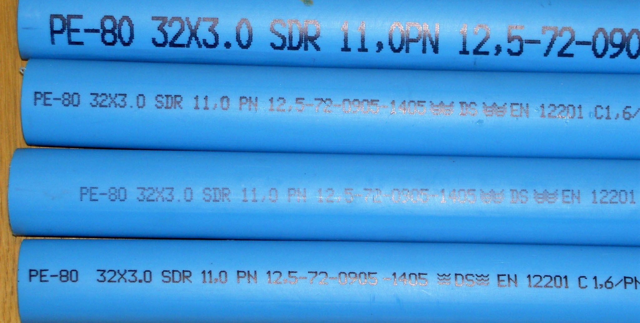 Alphanumeric code on plastic pipe made with MMS V-Series marking machine 