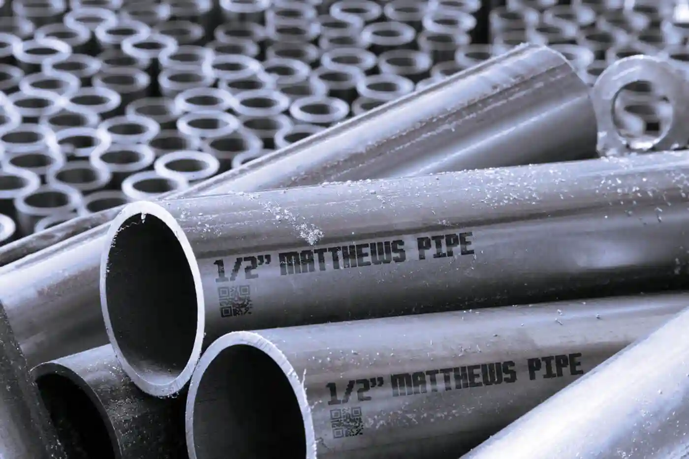 Steel pipe with large character human readable text and 2D code using V-Series marking machine