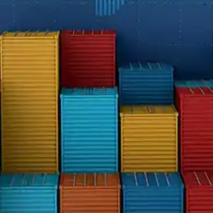 Stacked shipping containers of various colors.
