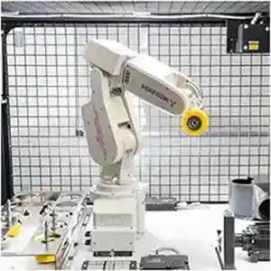 Industrial robot in a safety cage featured image.