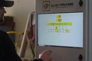 EstiFrame's EasyFrame control panel with OEM marking powered by MPERIA. Worker using the EasyFrame control panel.