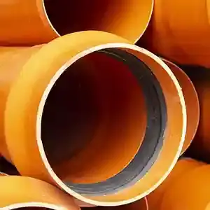 Featured image of large stacked orange pipes.