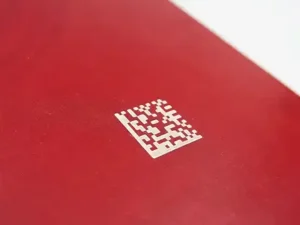 Laser Engraved 2D data matrix barcode on colored cardboard