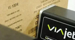 Matthews Marking Systems VIAjet™ T-Series printer applying high-resolution text and barcodes directly onto a cardboard case.