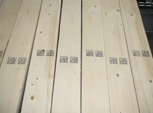 2D codes printed on multiple lumber boards