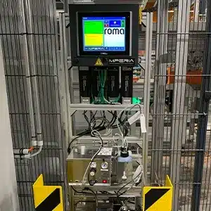 MPERIA controller managing V-Series drop-on-demand inkjet printers and A-series pallet labeler on a production line at ROMA for automated inline box marking.