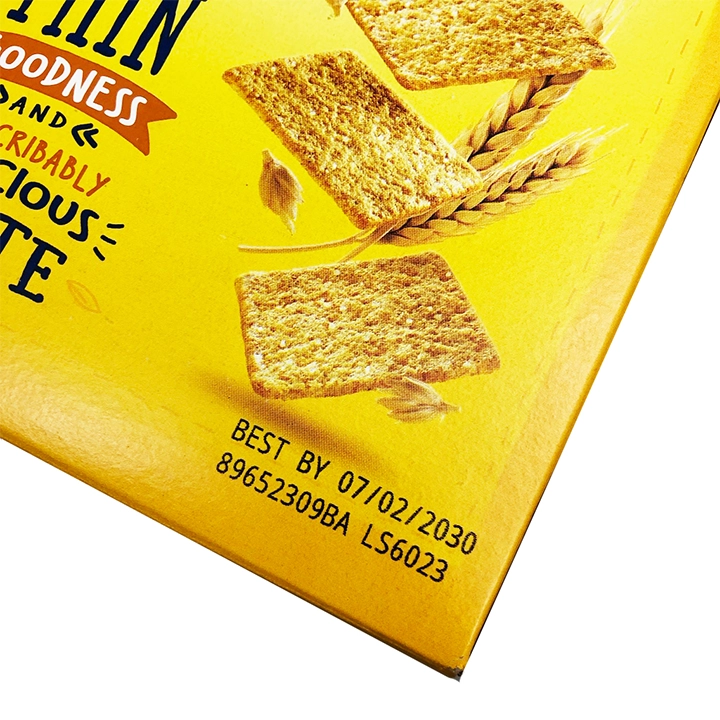 Best-by date and lot code printed on a paperboard food carton for product traceability.