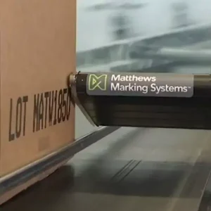 V-Series drop-on-demand printer from Matthews Marking Systems printing large characters on a product carton.