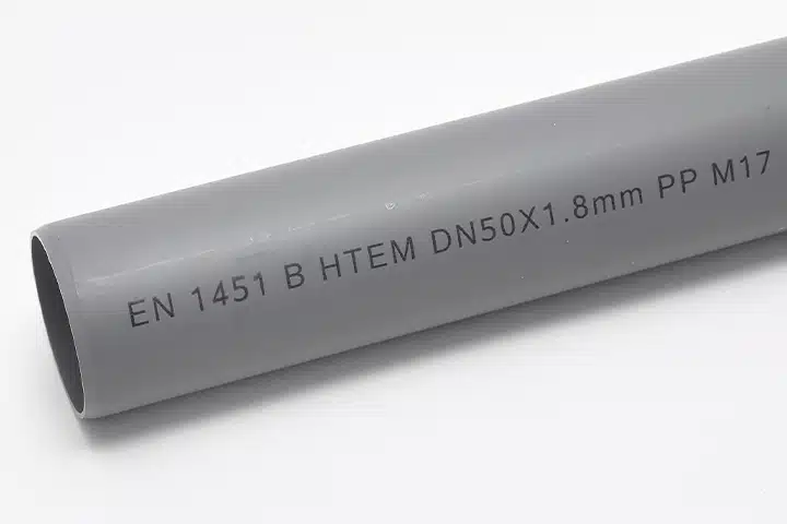 Industrial inkjet printed identification code on a gray PVC pipe for product traceability.