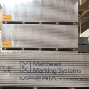 Matthews Marking Systems branding printed across stacked wood products