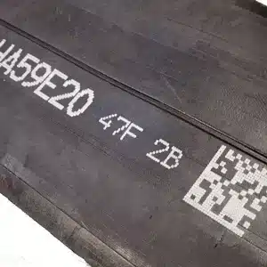 2D code and alphanumeric text marked on a tire