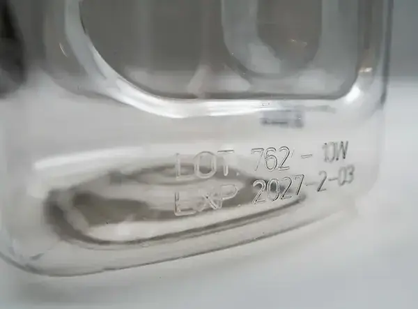 Permanent laser code marked on clear PET plastic