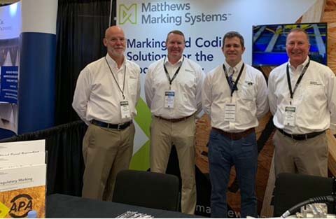 Matthews Marking Systems team at the EWTA booth in 2022