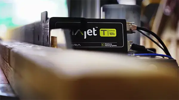 T series print head on wood production line.