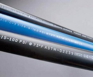 Alphanumeric production codes printed on plastic pipes